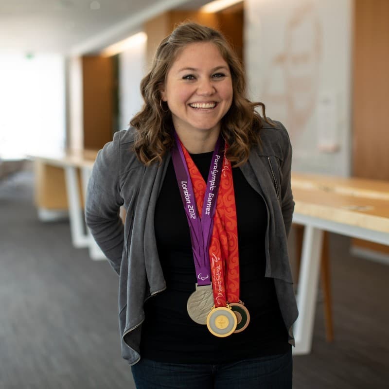 Anna Eames DeSalvo wearing her Beijing 2008 and London 2012 Paralympic medals
